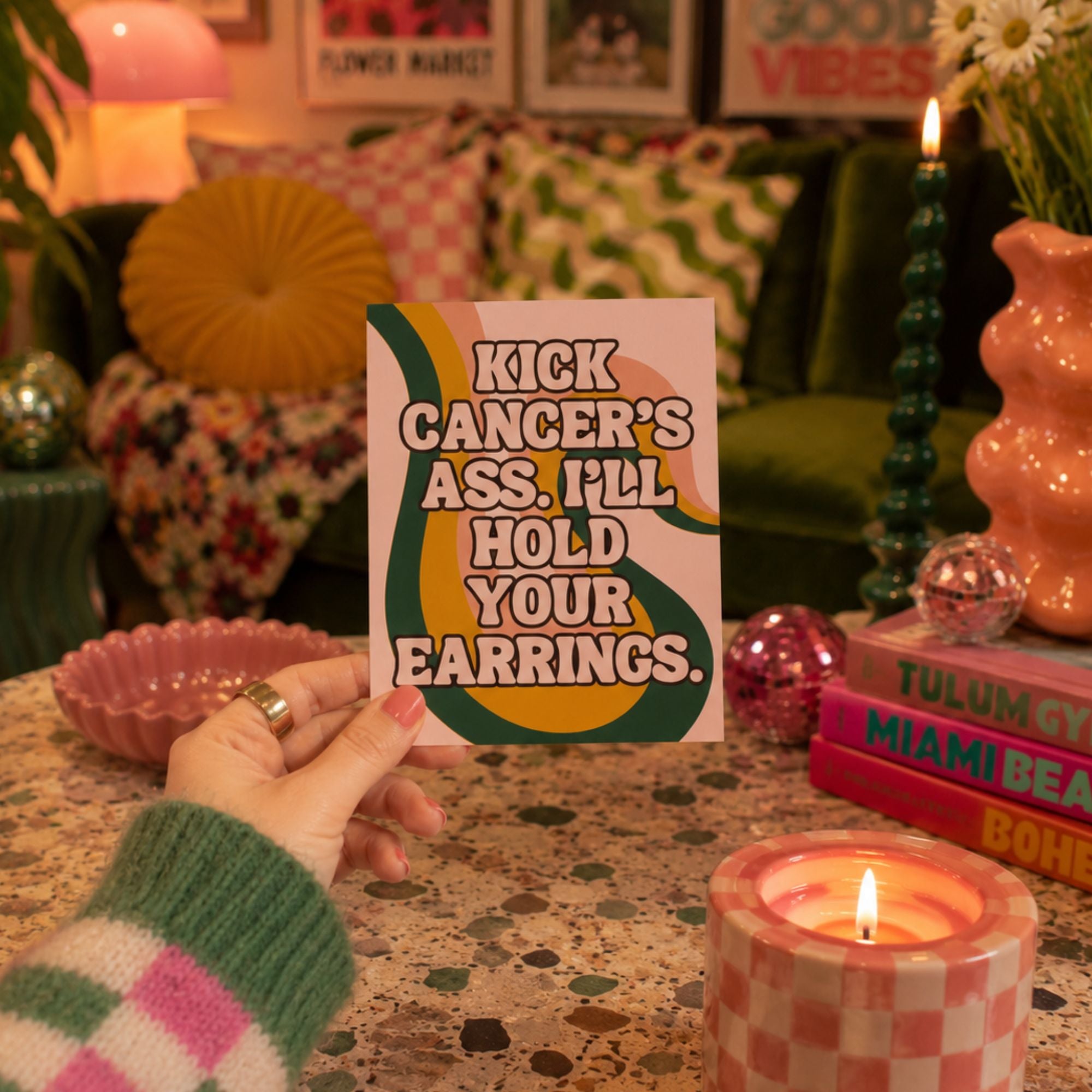 Funny cancer fighter support card that reads 'kick cancer's ass, I'll hold your earrings.'