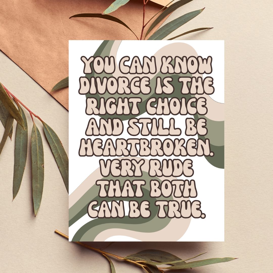 A square white art print with a humorous divorce quote in bold retro-style lettering, styled on a beige surface with abstract green and brown shapes and eucalyptus leaves.