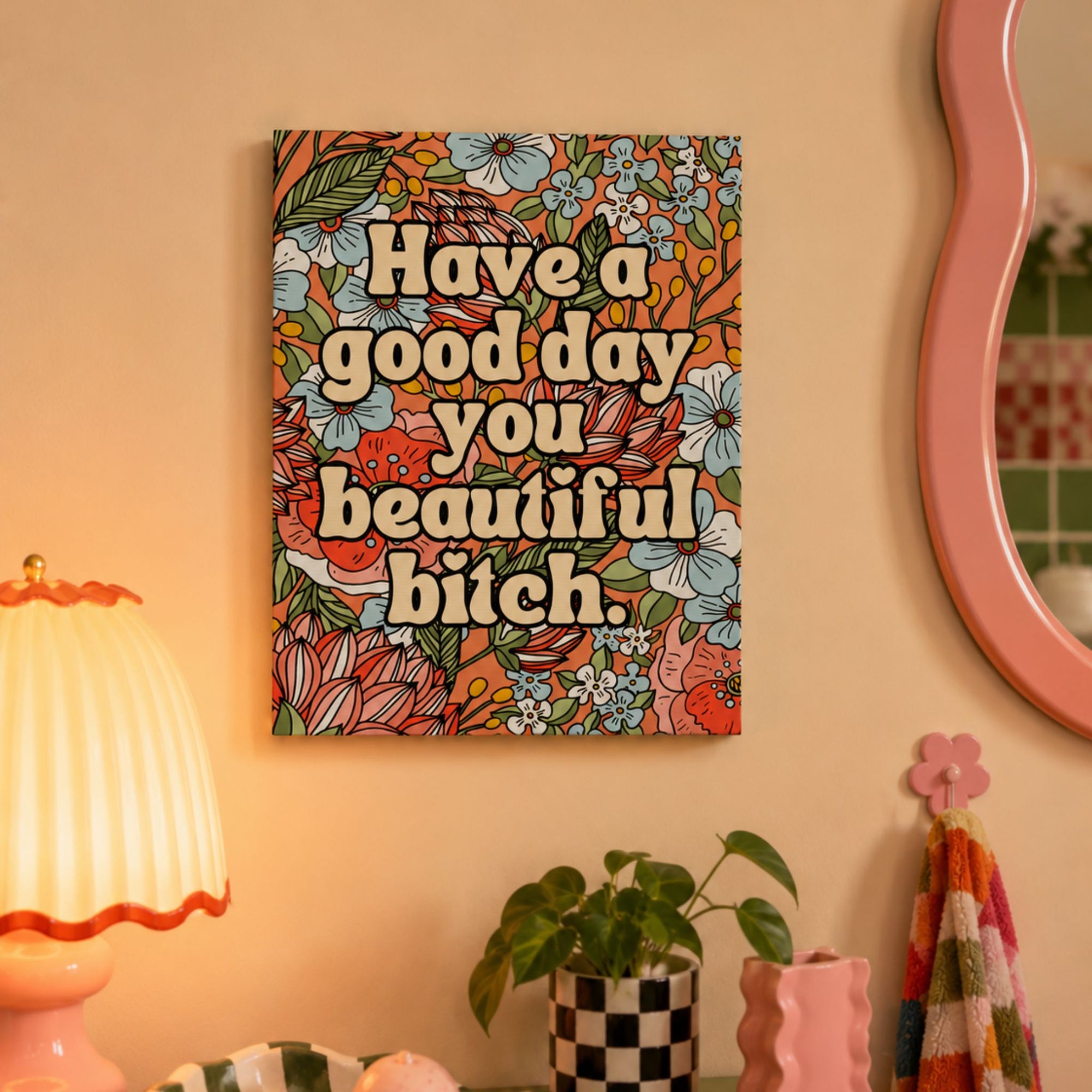 Funny floral canvas wall art that reads 'have a good day you beautiful bitch.'